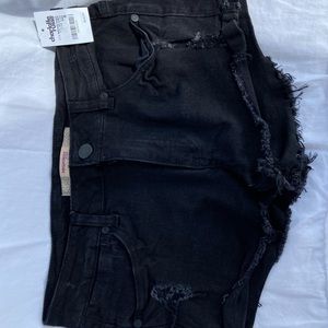 Black distressed jean shorts